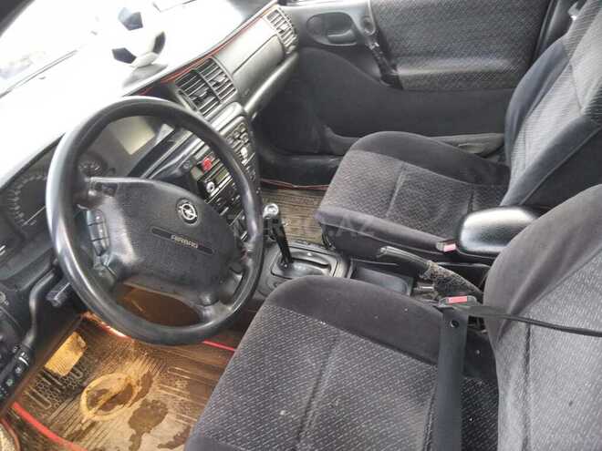 Opel Vectra 1996, 234,656 km - 2.0 l - Quba