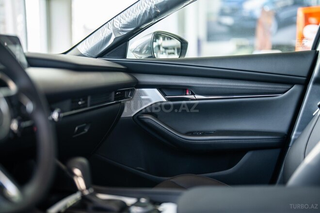Mazda 3-13