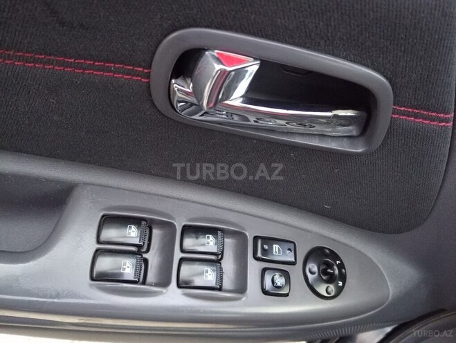 Kia Rio 2006, 292,582 km - 1.4 l - Quba