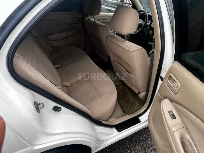 Nissan Sunny 2009, 239,000 km - 1.3 l - Bakı