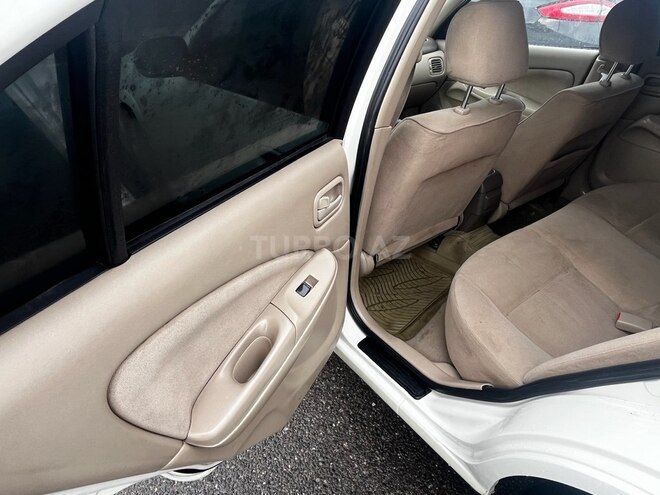 Nissan Sunny 2009, 239,000 km - 1.3 l - Bakı