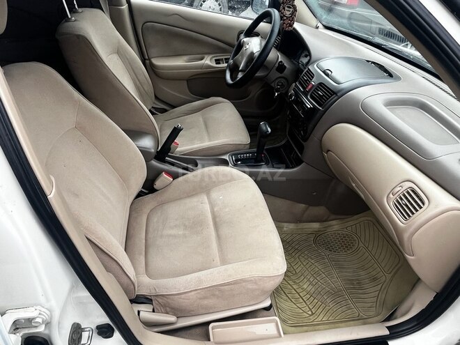 Nissan Sunny 2009, 239,000 km - 1.3 l - Bakı