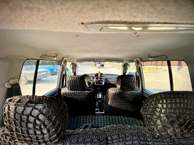 Mitsubishi Pajero io 1999, 221,423 km - 1.8 l - Bakı