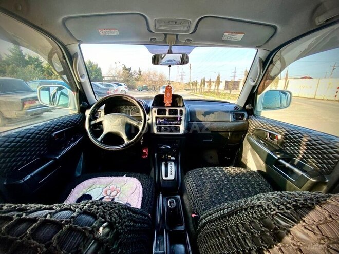 Mitsubishi Pajero io 1999, 221,423 km - 1.8 l - Bakı