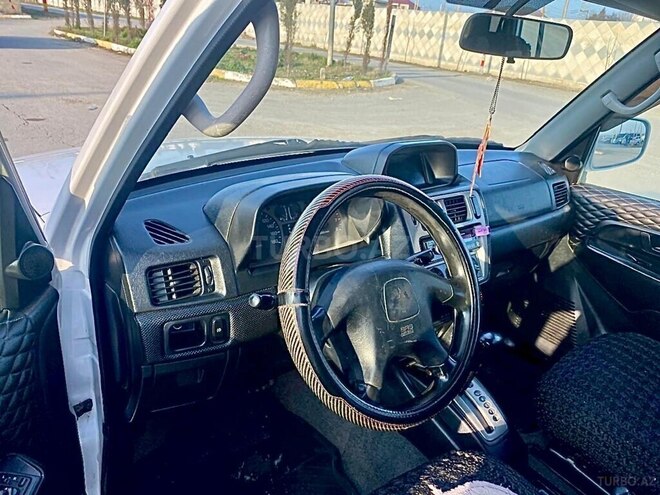 Mitsubishi Pajero io 1999, 221,423 km - 1.8 l - Bakı