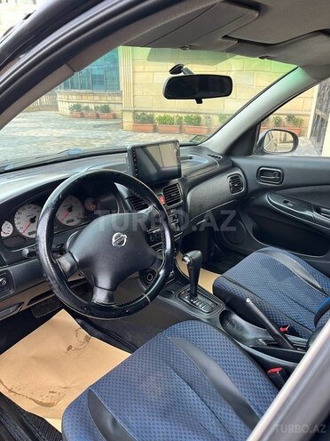 Nissan Sunny 2009, 270,000 km - 1.6 l - Bakı