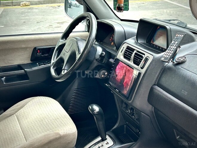Mitsubishi Pajero io 2001, 290,000 km - 2.0 л - Bakı