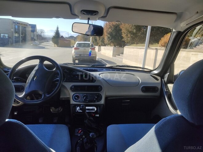 Chevrolet Niva 2005, 10,800 km - 1.7 l - Qusar