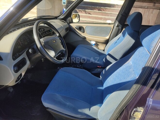 Chevrolet Niva 2005, 10,800 km - 1.7 l - Qusar