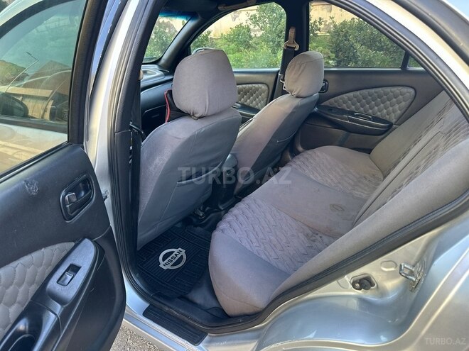 Nissan Sunny 2006, 410,000 km - 1.3 l - Bakı