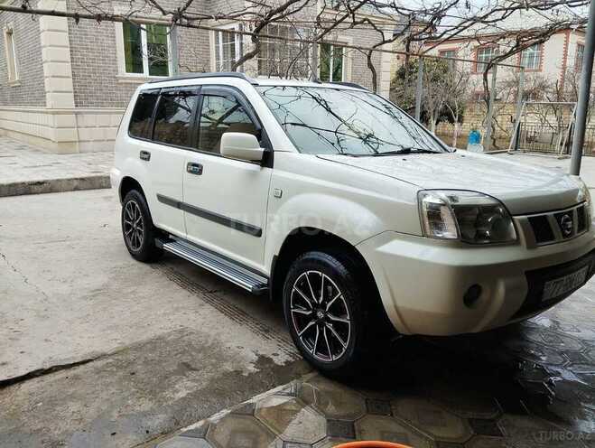Nissan X-Trail 2009, 218,000 km - 2.5 л - Bakı