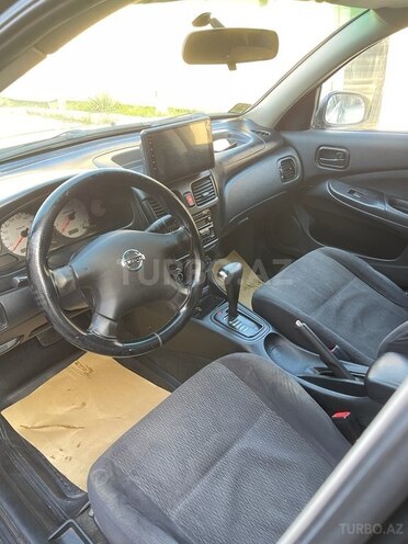 Nissan Sunny 2009, 220,000 km - 1.3 l - Bakı