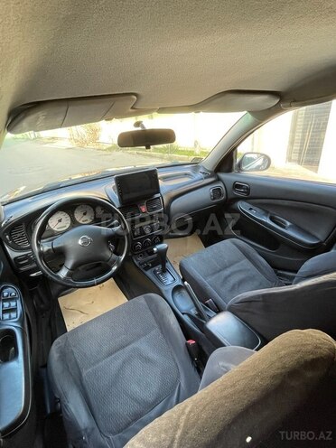 Nissan Sunny 2009, 220,000 km - 1.3 l - Bakı