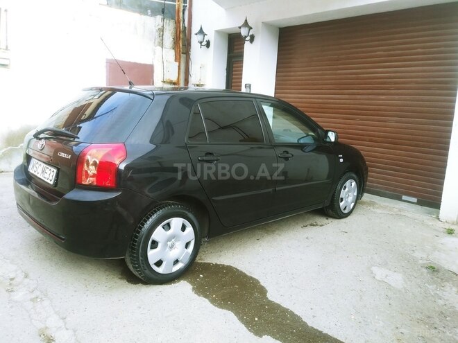 Toyota Corolla 2006, 245,000 km - 1.4 l - Bakı