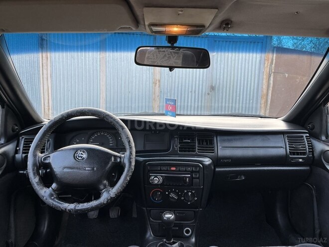 Opel Vectra 1997, 321,000 km - 1.6 l - Qazax