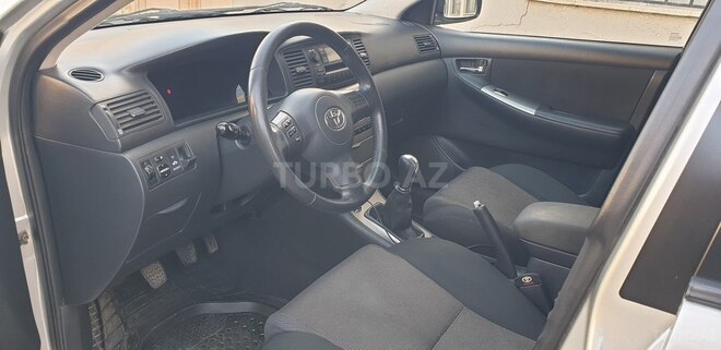 Toyota Corolla 2006, 233,000 km - 1.4 l - Bakı