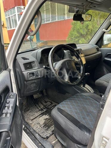 Mitsubishi Pajero io 2001, 260,000 km - 2.0 л - Bakı