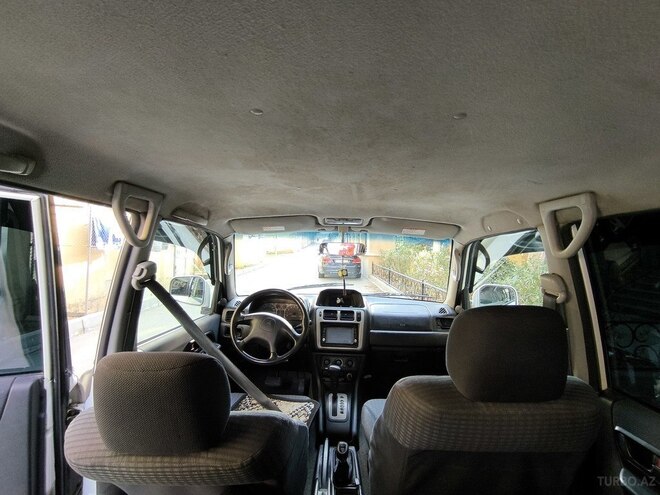 Mitsubishi Pajero io 1999, 180,000 km - 1.8 л - Bakı