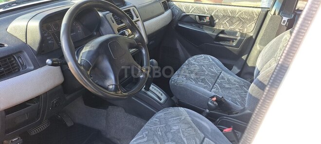 Mitsubishi Pajero io 1998, 123,000 km - 1.8 l - Qazax