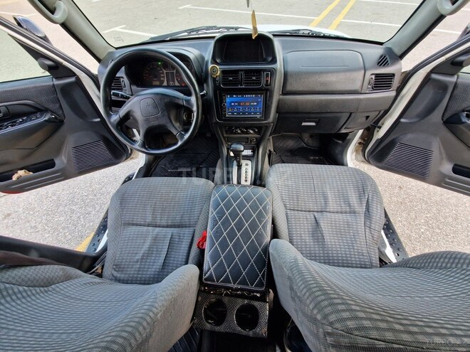 Mitsubishi Pajero io 1999, 276,526 km - 1.8 l - Sumqayıt