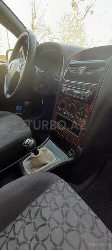 Opel Astra 1999, 402,000 km - 1.6 l - Quba