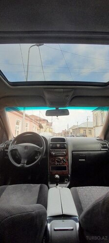 Opel Astra 1999, 402,000 km - 1.6 l - Quba