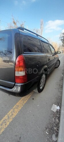 Opel Astra 1999, 402,000 km - 1.6 l - Quba