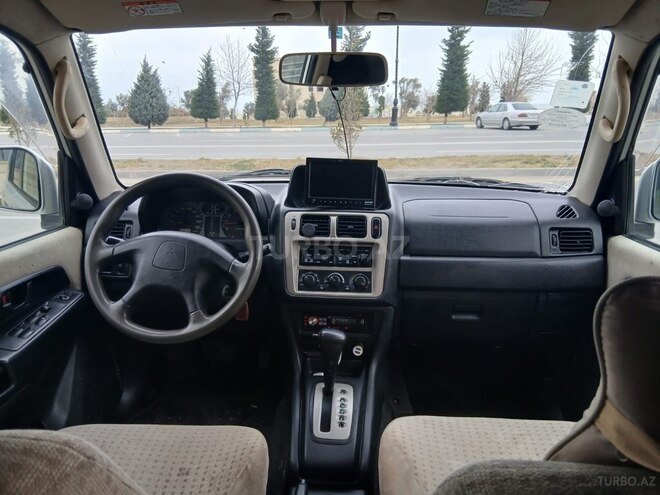 Mitsubishi Pajero io 2002, 294,000 km - 2.0 л - Sumqayıt