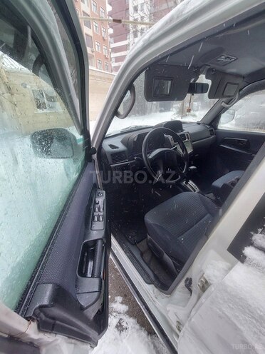 Mitsubishi Pajero io 1999, 323,000 km - 1.8 l - Bakı