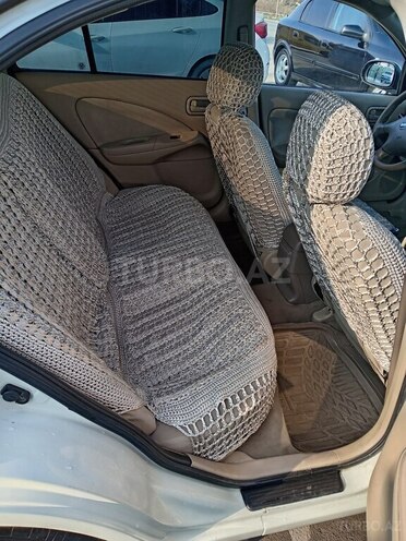 Nissan Sunny 2010, 328,000 km - 1.6 l - Bakı