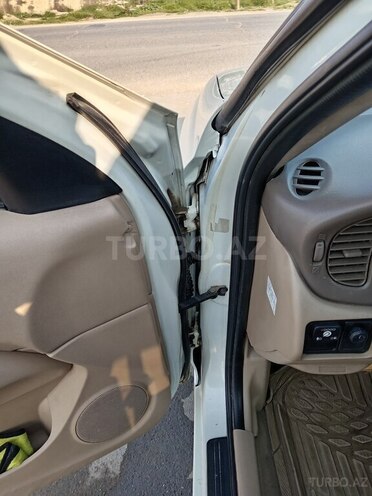 Nissan Sunny 2010, 328,000 km - 1.6 l - Bakı