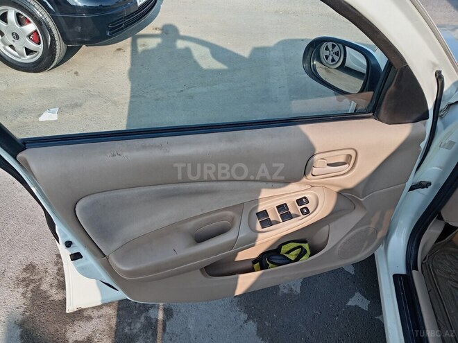 Nissan Sunny 2010, 328,000 km - 1.6 l - Bakı