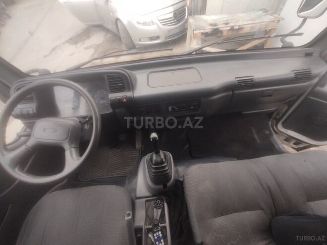 Isuzu NPR 66 L 2009, 261,000 km - 4.3 l - Bakı