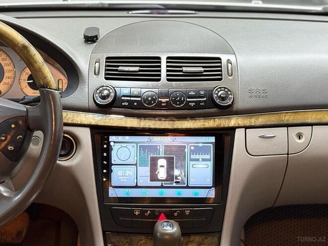 Mercedes E 280-11