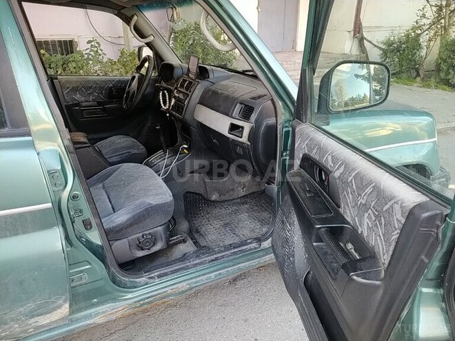 Mitsubishi Pajero io 1999, 280,000 km - 1.8 л - Bakı