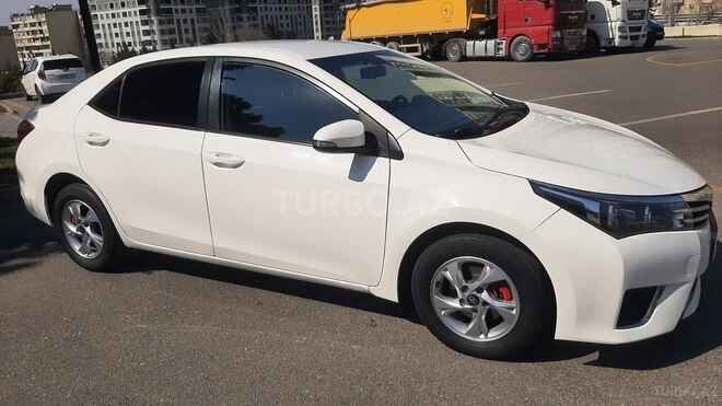 Toyota Corolla 2015, 175,000 km - 1.6 l - Bakı