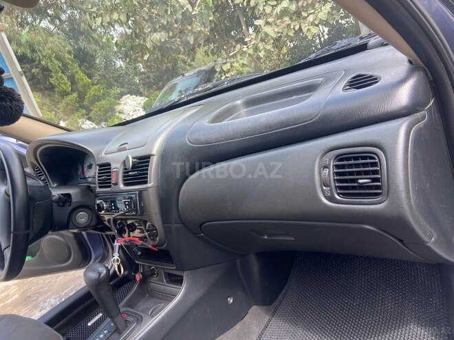 Nissan Sunny 2005, 370,000 km - 1.3 l - Bakı