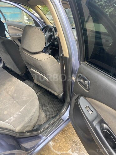 Nissan Sunny 2005, 370,000 km - 1.3 l - Bakı
