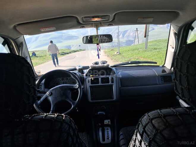 Mitsubishi Pajero io 2000, 348,000 km - 2.0 л - Yardımlı