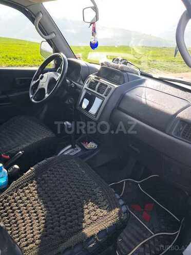 Mitsubishi Pajero io 2000, 348,000 km - 2.0 л - Yardımlı