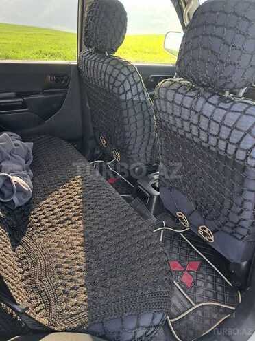 Mitsubishi Pajero io 2000, 348,000 km - 2.0 л - Yardımlı