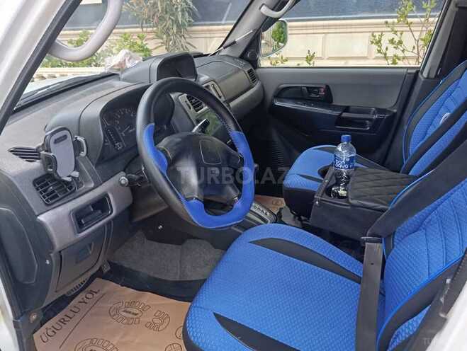 Mitsubishi Pajero io 1999, 190,175 km - 1.8 l - Bakı