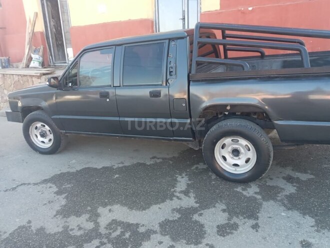 Mitsubishi L200 1993, 256,459 km - 2.5 л - Qusar