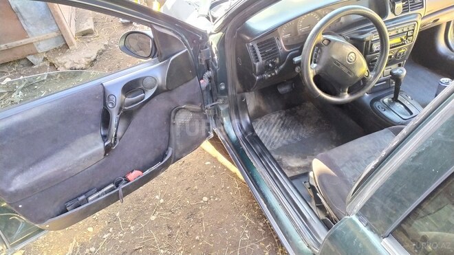 Opel Vectra 1998, 560,000 km - 1.6 l - Qusar