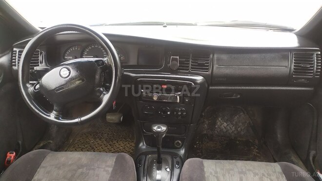 Opel Vectra 1998, 560,000 km - 1.6 l - Qusar