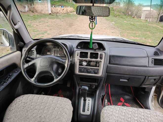 Mitsubishi Pajero io 2000, 420,000 km - 2.0 л - Yardımlı