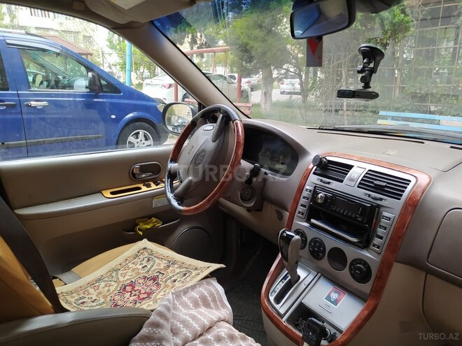 Kia Carnival 2003, 150,000 km - 2.9 l - Bakı