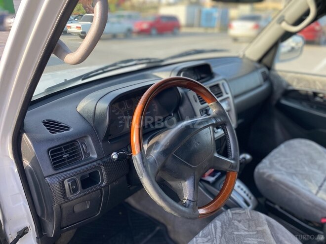 Mitsubishi Pajero io 1999, 288,300 km - 1.8 l - Bakı