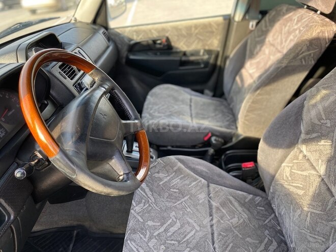 Mitsubishi Pajero io 1999, 288,300 km - 1.8 l - Bakı