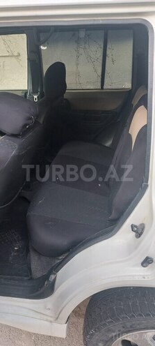 Mitsubishi Pajero io 2001, 230,000 km - 2.0 l - Bakı